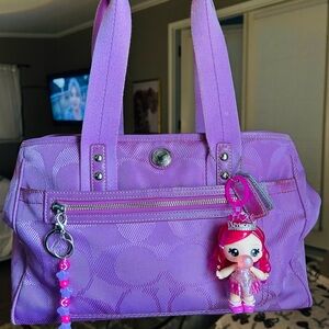 Authentic discontinued purple Coach signature stripe tote💜